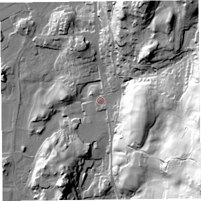 Shaded relief map of the ground around LA220DN, computed from Environment Agency LiDAR. The ground here sits at about 52 m above sea level and falls 107 m across the surrounding 800 m. Surface water reaching this point runs off ground lying to the east, 72.0 m higher.