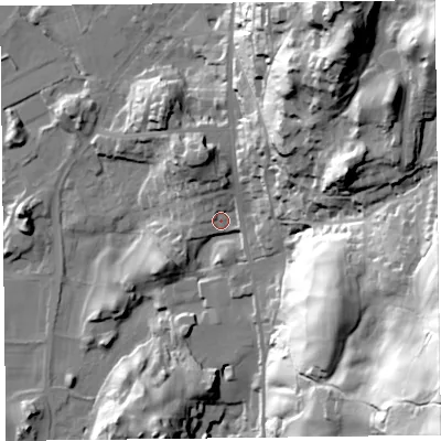 Shaded relief map of the ground around LA220DQ, computed from Environment Agency LiDAR. The ground here sits at about 51 m above sea level and falls 90 m across the surrounding 800 m. Surface water reaching this point runs off ground lying to the north-north-west, 11.3 m higher.