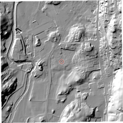 Shaded relief map of the ground around LA220DZ, computed from Environment Agency LiDAR. The ground here sits at about 43 m above sea level and falls 63 m across the surrounding 800 m. Surface water reaching this point runs off ground lying to the south-east, 1.3 m higher.