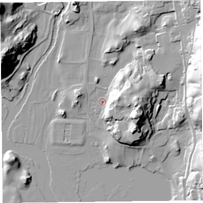 Shaded relief map of the ground around LA220EN, computed from Environment Agency LiDAR. The ground here sits at about 42 m above sea level and falls 39 m across the surrounding 800 m. Surface water reaching this point runs off ground lying to the east-north-east, 27.5 m higher.