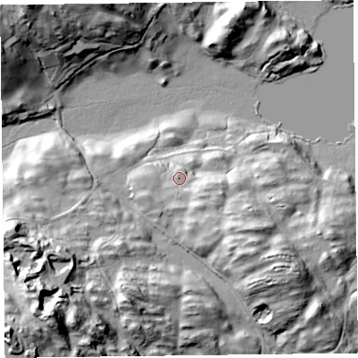 Shaded relief map of the ground around LA220HZ, computed from Environment Agency LiDAR. The ground here sits at about 57 m above sea level and falls 61 m across the surrounding 800 m. Surface water reaching this point runs off ground lying to the south-east, 4.9 m higher.