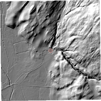 Shaded relief map of the ground around LA220JS, computed from Environment Agency LiDAR. The ground here sits at about 74 m above sea level and falls 108 m across the surrounding 800 m. Surface water reaching this point runs off ground lying to the east-north-east, 100.0 m higher.