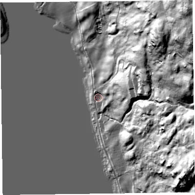 Shaded relief map of the ground around LA220JX, computed from Environment Agency LiDAR. The ground here sits at about 69 m above sea level and falls 129 m across the surrounding 800 m. Surface water reaching this point runs off ground lying to the east-north-east, 51.1 m higher.