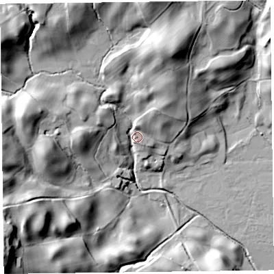 Shaded relief map of the ground around LA220NA, computed from Environment Agency LiDAR. The ground here sits at about 82 m above sea level and falls 56 m across the surrounding 800 m. Surface water reaching this point runs off ground lying to the west, 33.6 m higher.