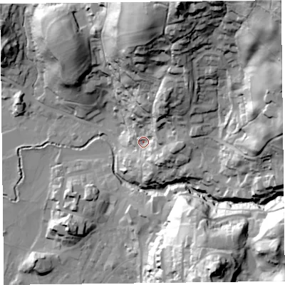Shaded relief map of the ground around LA229AX, computed from Environment Agency LiDAR. The ground here sits at about 63 m above sea level and falls 109 m across the surrounding 800 m. Surface water reaching this point runs off ground lying to the north-north-east, 37.7 m higher.