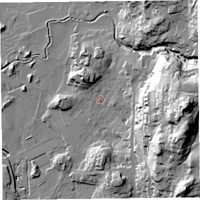 Shaded relief map of the ground around LA229DJ, computed from Environment Agency LiDAR. The ground here sits at about 50 m above sea level and falls 76 m across the surrounding 800 m. Surface water reaching this point runs off ground lying to the east, 61.6 m higher.
