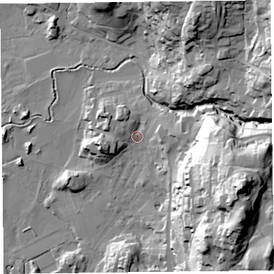 Shaded relief map of the ground around LA229DR, computed from Environment Agency LiDAR. The ground here sits at about 53 m above sea level and falls 72 m across the surrounding 800 m. Surface water reaching this point runs off ground lying to the east-north-east, 12.2 m higher.