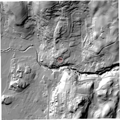 Shaded relief map of the ground around LA229EE, computed from Environment Agency LiDAR. The ground here sits at about 71 m above sea level and falls 114 m across the surrounding 800 m. Surface water reaching this point runs off ground lying to the north-north-east, 12.8 m higher.