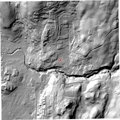 Shaded relief map of the ground around LA229EH, computed from Environment Agency LiDAR. The ground here sits at about 77 m above sea level and falls 128 m across the surrounding 800 m. Surface water reaching this point runs off ground lying to the north-east, 97.4 m higher.