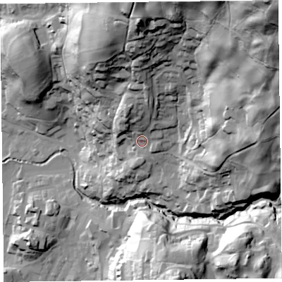 Shaded relief map of the ground around LA229EQ, computed from Environment Agency LiDAR. The ground here sits at about 82 m above sea level and falls 145 m across the surrounding 800 m. Surface water reaching this point runs off ground lying to the north, 19.7 m higher.