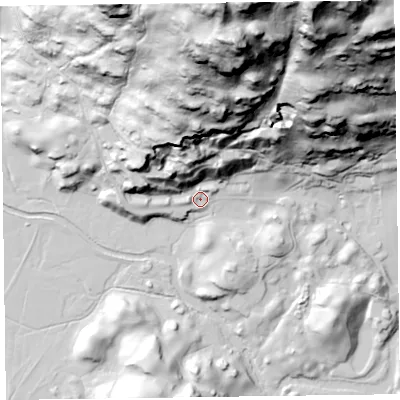 Shaded relief map of the ground around LA229JL, computed from Environment Agency LiDAR. The ground here sits at about 83 m above sea level and falls 188 m across the surrounding 800 m. Surface water reaching this point runs off ground lying to the north, 136.5 m higher.