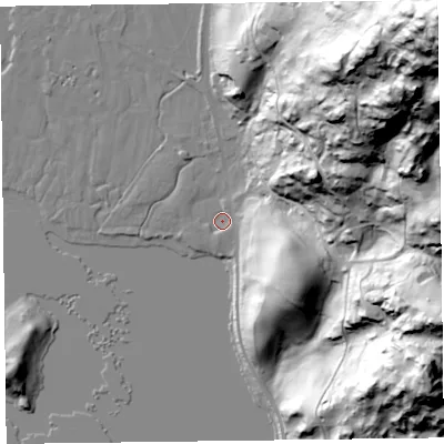 Shaded relief map of the ground around LA229PR, computed from Environment Agency LiDAR. The ground here sits at about 63 m above sea level and falls 147 m across the surrounding 800 m. Surface water reaching this point runs off ground lying to the north-east, 127.4 m higher.