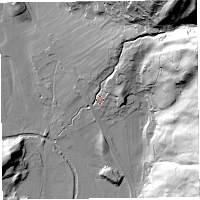 Shaded relief map of the ground around LA229TF, computed from Environment Agency LiDAR. The ground here sits at about 82 m above sea level and falls 134 m across the surrounding 800 m. Surface water reaching this point runs off ground lying to the north-east, 123.4 m higher.