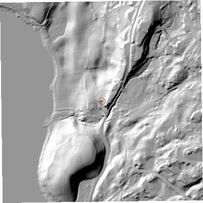 Shaded relief map of the ground around LA231EY, computed from Environment Agency LiDAR. The ground here sits at about 64 m above sea level and falls 65 m across the surrounding 800 m. Surface water reaching this point runs off ground lying to the east, 12.7 m higher.