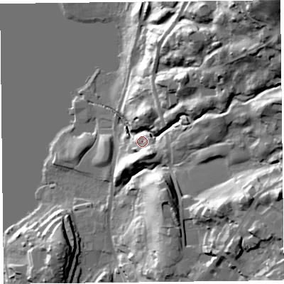 Shaded relief map of the ground around LA233DS, computed from Environment Agency LiDAR. The ground here sits at about 55 m above sea level and falls 67 m across the surrounding 800 m. Surface water reaching this point runs off ground lying to the south-south-east, 12.8 m higher.