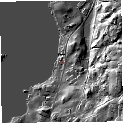 Shaded relief map of the ground around LA233JG, computed from Environment Agency LiDAR. The ground here sits at about 42 m above sea level and falls 55 m across the surrounding 800 m. Surface water reaching this point runs off ground lying to the north-east, 10.1 m higher.