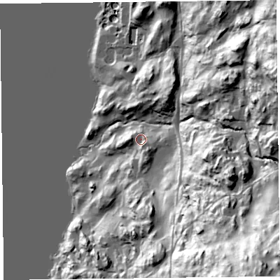 Shaded relief map of the ground around LA233PL, computed from Environment Agency LiDAR. The ground here sits at about 57 m above sea level and falls 113 m across the surrounding 800 m. Surface water reaching this point runs off ground lying to the south-east, 7.6 m higher.
