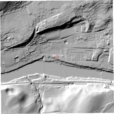 Shaded relief map of the ground around LA26RN, computed from Environment Agency LiDAR. The ground here sits at about 12 m above sea level and falls 52 m across the surrounding 800 m. Surface water reaching this point runs off ground lying to the north-north-east, 31.2 m higher.