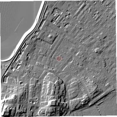 Shaded relief map of the ground around LA31EG, computed from Environment Agency LiDAR. The ground here sits at about 5 m above sea level and falls 21 m across the surrounding 800 m. Surface water reaching this point runs off ground lying to the south, 12.8 m higher.