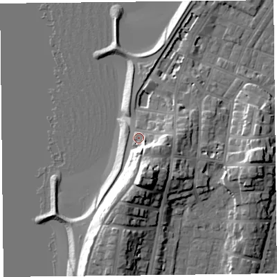 Shaded relief map of the ground around LA31NS, computed from Environment Agency LiDAR. The ground here sits at about 9 m above sea level and falls 21 m across the surrounding 800 m. Surface water reaching this point runs off ground lying to the south, 15.6 m higher.