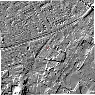 Shaded relief map of the ground around LA33DT, computed from Environment Agency LiDAR. The ground here sits at about 5 m above sea level and falls 7 m across the surrounding 800 m. Surface water reaching this point runs off ground lying to the north-west, 1.0 m higher.