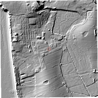 Shaded relief map of the ground around LA33FG, computed from Environment Agency LiDAR. The ground here sits at about 9 m above sea level and falls 16 m across the surrounding 800 m. Surface water reaching this point runs off ground lying to the west-south-west, 3.9 m higher.