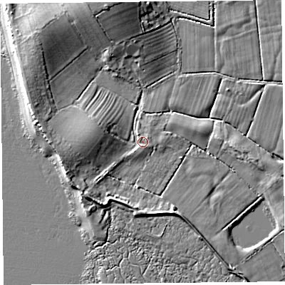 Shaded relief map of the ground around LA33LL, computed from Environment Agency LiDAR. The ground here sits at about 6 m above sea level and falls 10 m across the surrounding 800 m. Surface water reaching this point runs off ground lying to the west, 3.8 m higher.