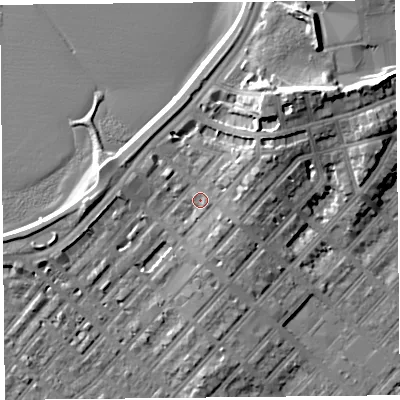 Shaded relief map of the ground around LA44HE, computed from Environment Agency LiDAR. The ground here sits at about 7 m above sea level and falls 13 m across the surrounding 800 m. Surface water reaching this point runs off ground lying to the east-north-east, 4.7 m higher.