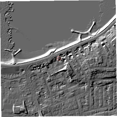 Shaded relief map of the ground around LA46AA, computed from Environment Agency LiDAR. The ground here sits at about 8 m above sea level and falls 8 m across the surrounding 800 m. Surface water reaching this point runs off ground lying to the west, 2.3 m higher.