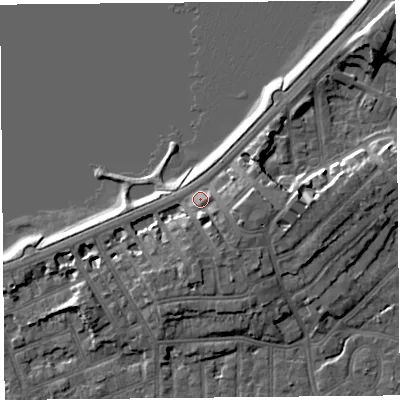 Shaded relief map of the ground around LA46AY, computed from Environment Agency LiDAR. The ground here sits at about 9 m above sea level and falls 9 m across the surrounding 800 m. Surface water reaching this point runs off ground lying to the south-south-east, 3.5 m higher.
