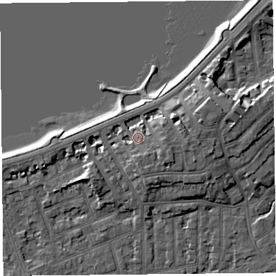 Shaded relief map of the ground around LA46BN, computed from Environment Agency LiDAR. The ground here sits at about 8 m above sea level and falls 9 m across the surrounding 800 m. Surface water reaching this point runs off ground lying to the south-east, 3.8 m higher.