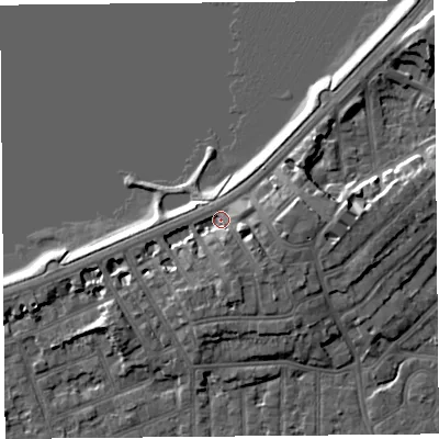 Shaded relief map of the ground around LA46BS, computed from Environment Agency LiDAR. The ground here sits at about 7 m above sea level and falls 9 m across the surrounding 800 m. Surface water reaching this point runs off ground lying to the south-east, 4.3 m higher.