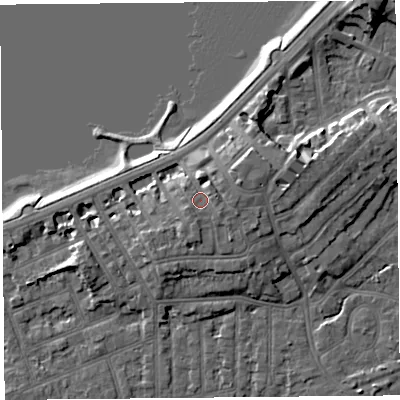 Shaded relief map of the ground around LA46BT, computed from Environment Agency LiDAR. The ground here sits at about 9 m above sea level and falls 9 m across the surrounding 800 m. Surface water reaching this point runs off ground lying to the south-east, 1.3 m higher.