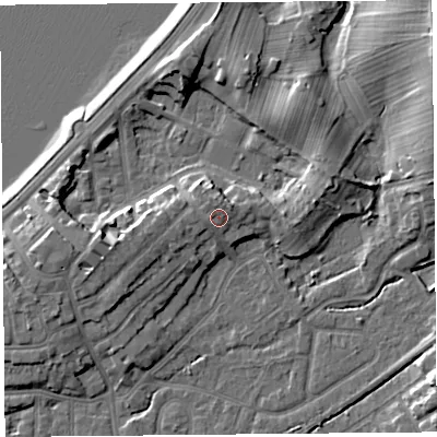Shaded relief map of the ground around LA46DJ, computed from Environment Agency LiDAR. The ground here sits at about 9 m above sea level and falls 12 m across the surrounding 800 m. Surface water reaching this point runs off ground lying to the north, 1.6 m higher.