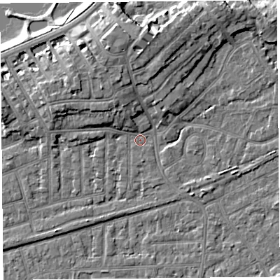 Shaded relief map of the ground around LA46ES, computed from Environment Agency LiDAR. The ground here sits at about 5 m above sea level and falls 9 m across the surrounding 800 m. Surface water reaching this point runs off ground lying to the north-north-west, 5.2 m higher.