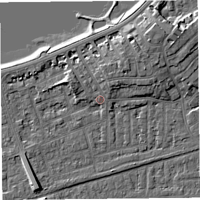 Shaded relief map of the ground around LA46ET, computed from Environment Agency LiDAR. The ground here sits at about 7 m above sea level and falls 9 m across the surrounding 800 m. Surface water reaching this point runs off ground lying to the north, 2.4 m higher.