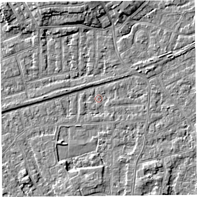 Shaded relief map of the ground around LA46JX, computed from Environment Agency LiDAR. The ground here sits at about 5 m above sea level and falls 5 m across the surrounding 800 m. Surface water reaching this point runs off ground lying to the south-south-west, 2.7 m higher.