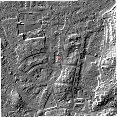 Shaded relief map of the ground around LA46RR, computed from Environment Agency LiDAR. The ground here sits at about 6 m above sea level and falls 7 m across the surrounding 800 m. Surface water reaching this point runs off ground lying to the south-east, 2.6 m higher.