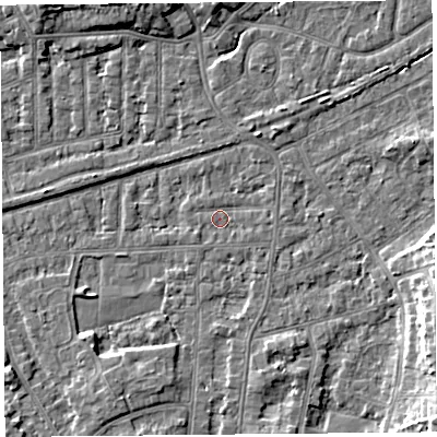 Shaded relief map of the ground around LA46SR, computed from Environment Agency LiDAR. The ground here sits at about 5 m above sea level and falls 7 m across the surrounding 800 m. Surface water reaching this point runs off ground lying to the north, 1.2 m higher.