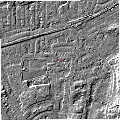 Shaded relief map of the ground around LA46UB, computed from Environment Agency LiDAR. The ground here sits at about 5 m above sea level and falls 6 m across the surrounding 800 m. Surface water reaching this point runs off ground lying to the north-north-east, 0.5 m higher.
