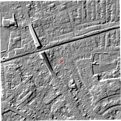 Shaded relief map of the ground around LA46UE, computed from Environment Agency LiDAR. The ground here sits at about 5 m above sea level and falls 7 m across the surrounding 800 m. Surface water reaching this point runs off ground lying to the west-north-west, 6.1 m higher.