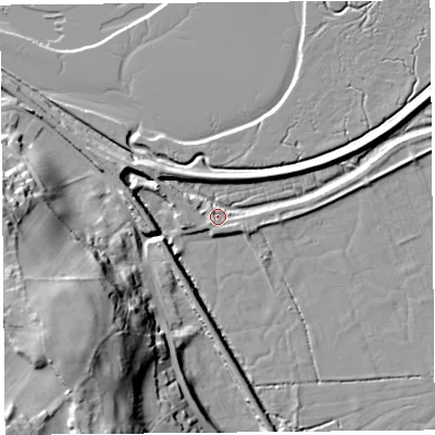 Shaded relief map of the ground around LA50HQ, computed from Environment Agency LiDAR. The ground here sits at about 6 m above sea level and falls 34 m across the surrounding 800 m. Surface water reaching this point runs off ground lying to the north-west, 5.1 m higher.