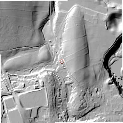 Shaded relief map of the ground around LA62DX, computed from Environment Agency LiDAR. The ground here sits at about 73 m above sea level and falls 65 m across the surrounding 800 m. Surface water reaching this point runs off ground lying to the east-north-east, 13.8 m higher.