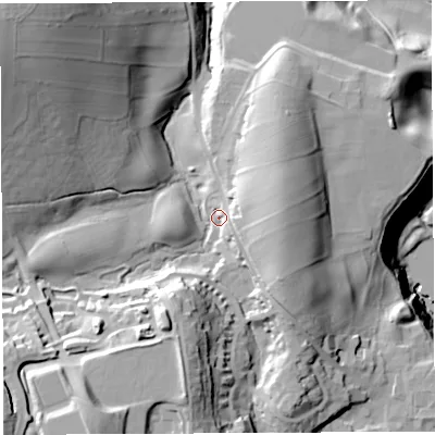 Shaded relief map of the ground around LA62FL, computed from Environment Agency LiDAR. The ground here sits at about 70 m above sea level and falls 67 m across the surrounding 800 m. Surface water reaching this point runs off ground lying to the south-west, 27.9 m higher.