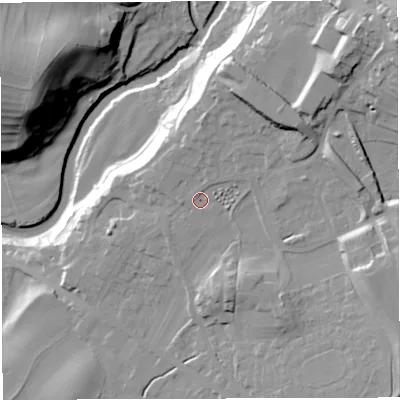 Shaded relief map of the ground around LA63BT, computed from Environment Agency LiDAR. The ground here sits at about 124 m above sea level and falls 50 m across the surrounding 800 m. Surface water reaching this point runs off ground lying to the north-east, 24.6 m higher.