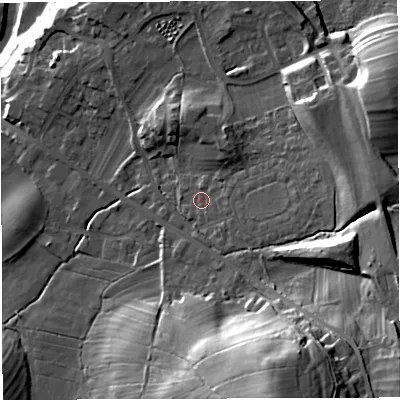 Shaded relief map of the ground around LA63DE, computed from Environment Agency LiDAR. The ground here sits at about 124 m above sea level and falls 50 m across the surrounding 800 m. Surface water reaching this point runs off ground lying to the east, 9.1 m higher.