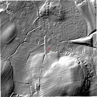 Shaded relief map of the ground around LA63DL, computed from Environment Agency LiDAR. The ground here sits at about 124 m above sea level and falls 41 m across the surrounding 800 m. Surface water reaching this point runs off ground lying to the south-east, 29.1 m higher.