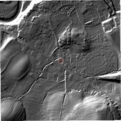 Shaded relief map of the ground around LA63FB, computed from Environment Agency LiDAR. The ground here sits at about 121 m above sea level and falls 51 m across the surrounding 800 m. Surface water reaching this point runs off ground lying to the south-east, 3.9 m higher.