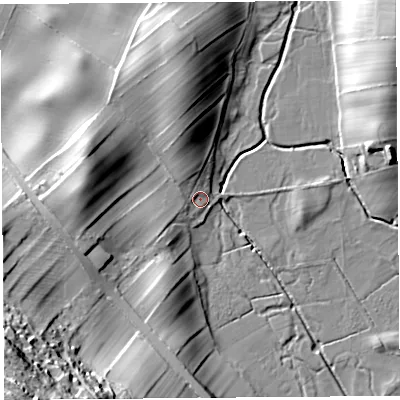 Shaded relief map of the ground around LA77BJ, computed from Environment Agency LiDAR. The ground here sits at about 25 m above sea level and falls 38 m across the surrounding 800 m. Surface water reaching this point runs off ground lying to the south-west, 34.9 m higher.