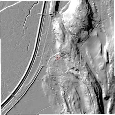 Shaded relief map of the ground around LA77JX, computed from Environment Agency LiDAR. The ground here sits at about 10 m above sea level and falls 47 m across the surrounding 800 m. Surface water reaching this point runs off ground lying to the north-east, 25.0 m higher.